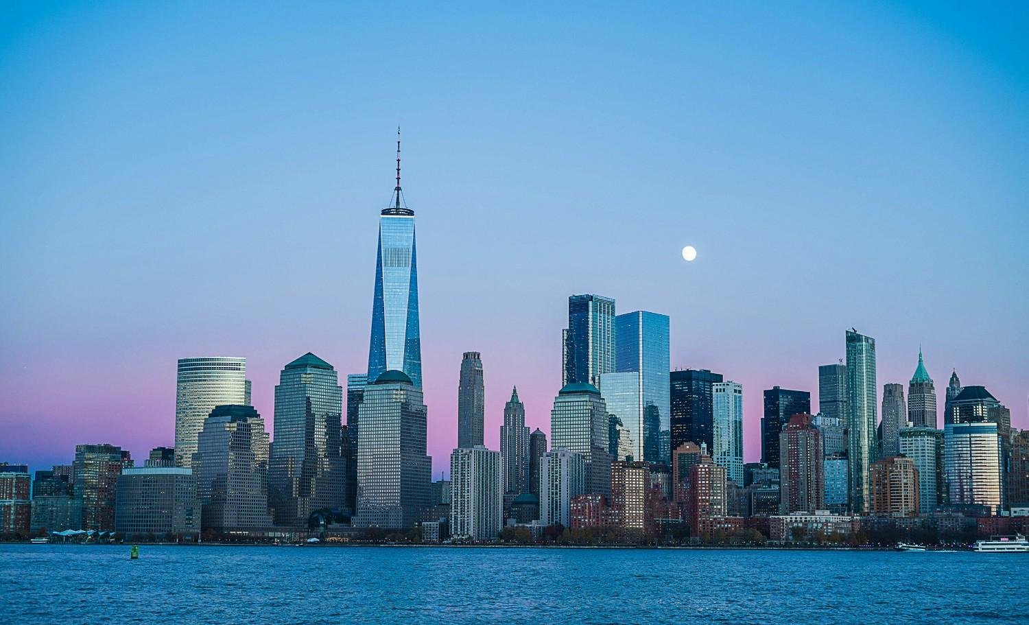 Cinematic metropolitan skyline at dusk with city lights